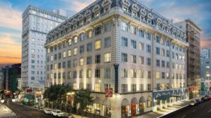 exterior of The Marker Hotel during sunset with view of street in San Francisco, California, USA